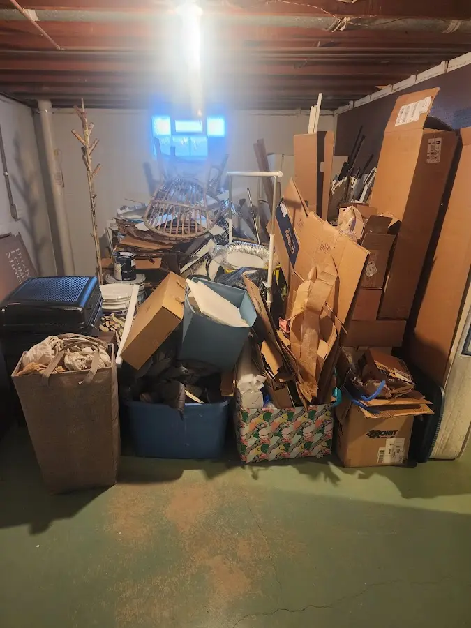 Roll-off dumpster container at job site for 8 Yard Dumpster Rental in Dalton